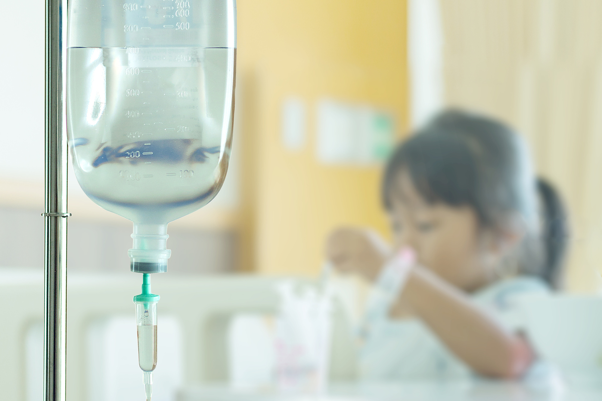 A pediatric patient receiving IV hydration.